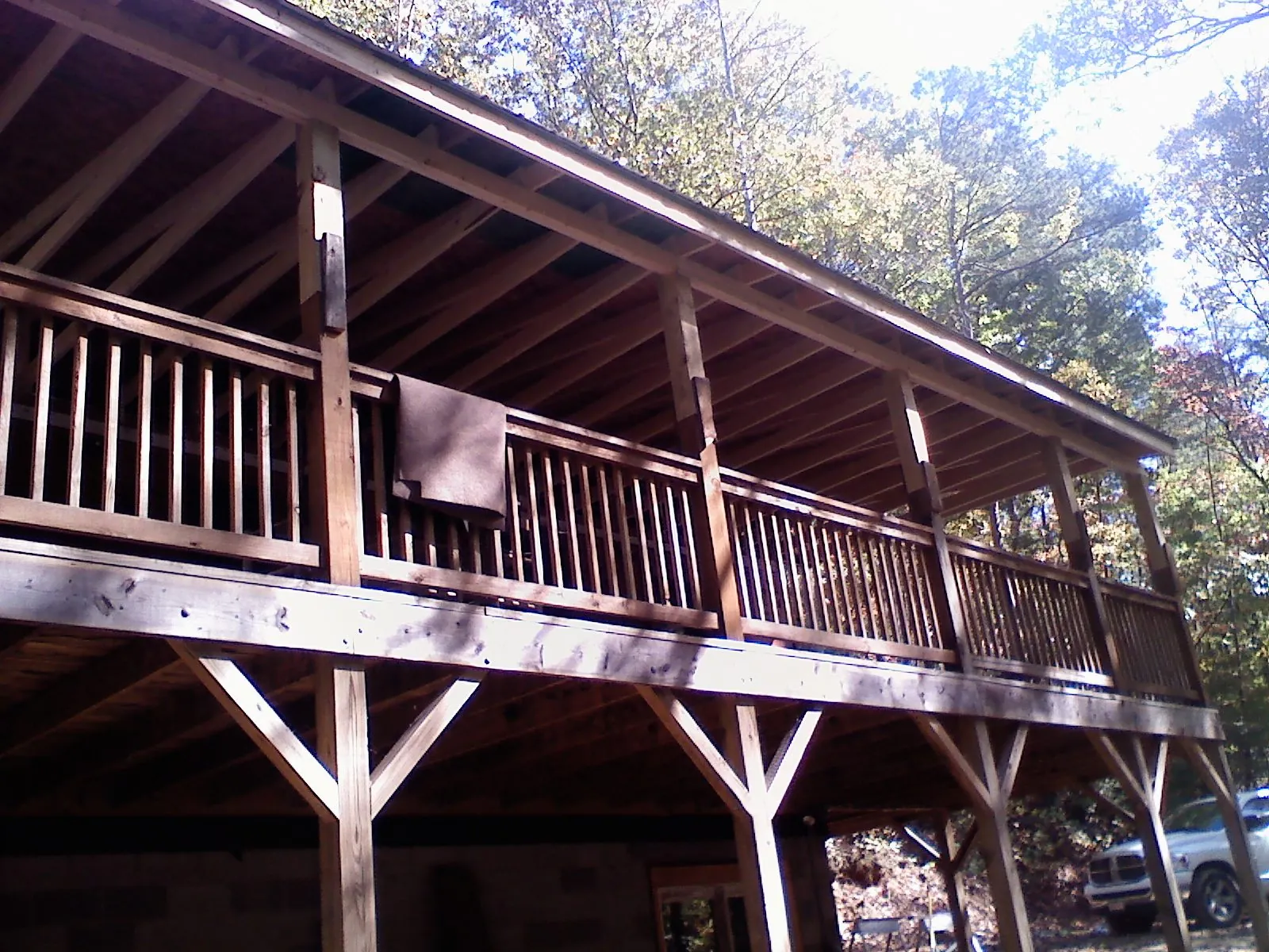 Timber framing under a new elevated porch and deck — Roof Leak Repair in Southern Pines by Roofing Brothers